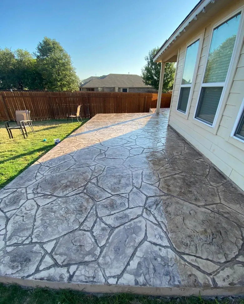 Stamped flagstone concrete patio with a wet finish